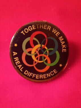 Together We Make A Real Difference metal and enamel pin